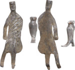 SILVER VOTIVE FIGURINES Ancient Mediterranean, c. 5th - 3rd century BC. Two silver figurines; one in the shape of a stylized man, the other in the sha...