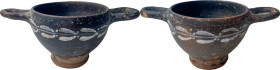 GNATHIAN STYLE SKYPHOS Apulian culture, c. 4th century BC. Small skyphos in the style of Gnathia, with receding lip, downward tapering body, ring foot...