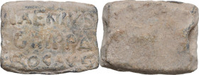 IMPORTANT LEAD SEAL Roman Empire, after 122 AD. Large and rare seal of rectangular shape, with hole intended to hold a lanyard. The front bears the in...