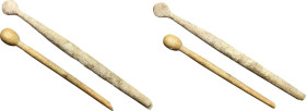 ROMAN UTENSILS Roman period, c. 1st - 3rd century AD. Lot of 2 bone utensils; a medical spoon and a pin. Lenghts: 108 and 82 mm.