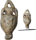 LARGE ROMAN LEAD AMPHORA Roman period, c. 1st - 3rd century AD. Large, heavy and unusual Roman solid lead amphora with a large bulbous main body taper...