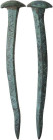 ROMAN 'MAGIC' NAIL Roman period, c. 2nd-3rd century AD. Bronze nail decorated with engraved geometrical pattern and corn-ears. Lenght: 85.50 mm. Sligh...