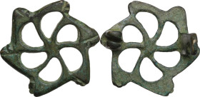 BRONZE OPENWORK FIBULA Roman period, c. 2nd - 4th century AD. Roman bronze fibula configured in a openwork hexahedron. Diameter: 29 mm. Rare and fasci...