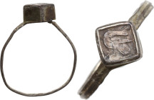 SILVERED DOVE RING Medieval period, c. 13th - 15th century AD. Silvered ring with square bezel with a dove engraved on the top. Inner size: 18 mm.