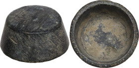 BRONZE CUP WEIGHT Medieval Age, England, c. 15th century AD. Weight in the shape of a bronze cup, with ‘punched-dot’ decoration around rim. Dimensions...