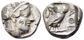 ATTICA. Athens.(Circa 454-404 BC).Tetradrachm.

Obv : Helmeted head of Athena right.

Rev : AΘE.
Owl standing right, head facing; olive sprig and cres...