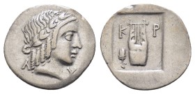 LYCIAN LEAGUE. Kragos.(48-42 BC).Hemidrachm.

Obv : Λ - Y.
Laureate head of Apollo right.

Rev : K - P.
Cithara (lyre) in incuse square and symb...