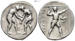 PAMPHYLIA, Aspendos. Circa 380/75-330/25 BC. AR Stater (22mm, 10.7 g). Two wrestlers grappling; BΛ between / Slinger in throwing stance right; triskel...