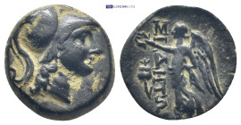 PAMPHYLIA. Side. AE Circa 200-36 BC. (16mm, 3.3 g) Helmeted head of Athena right. Rev. Nike advancing left, holding wreath; in left field, pomegranate...