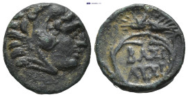 KINGS OF THRACE. Lysimachus. Ae (11.9mm, 1.3 g) (323-281 BC). Obv: Head of Herakles right, wearing lion's skin headress. Rev: ΒΑΣΙ / ΛΥΣΙ. Legend with...