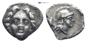 Pisidia. Selge 350-300 BC. Obol AR (10mm., 0,9 g). Facing gorgoneion / Helmeted head of Athena right; behind, astragalos.