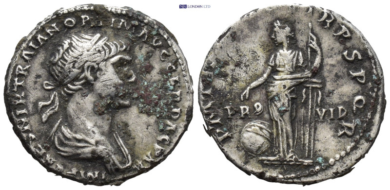 TRAJAN. 114-117 AD. AR Denarius (3.6 Gr. 18mm.)
Laureate, draped bust right. 
Re...