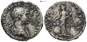 TRAJAN. 114-117 AD. AR Denarius (3.6 Gr. 18mm.)
Laureate, draped bust right. 
Rev. Providentia, standing left, pointing hand at large globe to left, a...