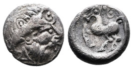 Eastern Celtic Tribes, imitating imitations of Philip II of Macedon, circa 2nd.-1st. Century BC. AR Drachm (13,5 mm, 1,83 g.) 'Kugelwange' type. Laure...