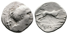 C. Postumius, after 73 BC. Celtic imitation of Republican AR Denarius (17 mm, 3,57 g.). Diademed bust of Diana right, wearing quiver and bow over shou...