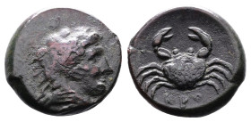 Bruttium, Kroton, circa 350-300 BC. AE (15,5 mm, 3,01 g.). Head of Herakles right, wearing lion skin headdress. Rev. Crab; KPO below. HN Italy 2225, W...