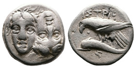 Moesia, Istros. 4th. Century BC. AR Drachm (19 mm, 5,01 g.). Facing male heads, the left inverted Rev. Sea eagle left, grasping dolphin with talons; I...