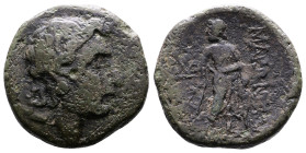 Thrace, Maroneia, circa 1st Century BC. AE (24 mm, 9,60 g.). Head of Dionysos to right. Rev. MAPΩNITΩ, Asklepios standing facing, head to left, leanin...