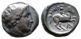 Kings of Macedon, Philip II, 359-336 BC. AE (17 mm, 5,94 g.), uncertain Macedonian mint, possibly Amphipolis. Diademed head of Apollo to right. Rev. Φ...