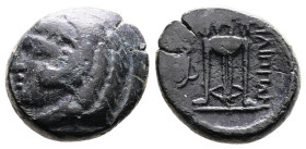 Macedon, Philippi, circa. 356-345 BC. AE ( 17,5 mm, 5,93 g.). Head of Herakles left, wearing lion's skin headdress. Rev. ΦΙΛΙΠΠΩΝ Tripod. HGC 3, 632 v...