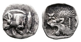 Mysia, Kyzikos, circa 450-400 BC. AR Hemiobol (9mm, 0.42g.). Forepart of boar left; to right, tunny upward. Rev. Head of roaring lion left; star to up...