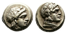 Lesbos, Mytilene, EL Hekte ( 10 mm, 2.52 g.). Head of Dionysos to right, wearing wreath of ivy and fruit. Rev. Head of a satyr to right, wearing wreat...