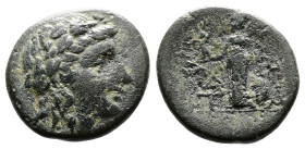 Aeolis, Temnos, 2nd.-1st. Century BC. AE ( 17,5mm, 3,81 g.). Wreathed head of Dionysos right. Rev. Athena Nikephoros standing left, holding grape bunc...