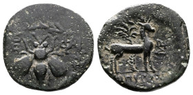 Ionia, Ephesos, circa 202-133 BC. AE (19,5mm, 4,48g.). E-Φ, bee within wreath. Rev. Stag standing to right before palm tree, monogram to right. SNG Co...