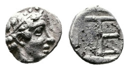 Ionia, Kolophon, circa 420-400 BC. AR Tetartemorion (6,66mm, 0,31 g.). Head of Apollo right. Rev. TE Mark of value (abbreviation of the denomination) ...