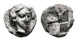 Ionia, Kolophon, circa 450-410 BC. AR Tetartemorion (6 mm, 0,17 g.). Head of Apollo facing slightly right. Rev. Quadripartite incuse square; Milne, Ko...