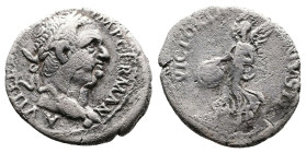 Vitellius, 69 AD. AR Denarius (18mm, 3,06g.). Lugdunum. A VITELLIVS IMP GERMAN, laureate head to right. Rev. VICTORIA AVGVSTI Victory advancing to lef...