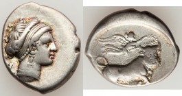 CAMPANIA. Neapolis. Ca. 320-300 BC. AR didrachm (19mm, 7.35 gm, 9h) VF, scratches. Head of Parthenope right, astragalus behind / Man-headed bull right...
