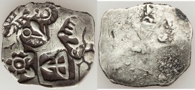 INDIA. Magadha. Ca. 500-430 BC. AR karshapana (21mm, 3.47 gm). VF. Punchmarked silver with symbols including: sun, six-armed symbol, bow-and-arrow, wh...
