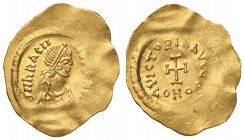 Eraclio (610-641) Tremisse - Busto diademato a d. - R/ Croce potenziata - Sear 786 AU (g 1,46) Pesanti ondulazioni del tondello 

qSPL