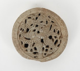 Élément en terre cuite ajourée à décor d’oiseaux affrontés
Terre cuite
Iran, XII – XIIIe siècle, période Seldjoukide
Diamètre : 9,5 cm

Cet intéressan...