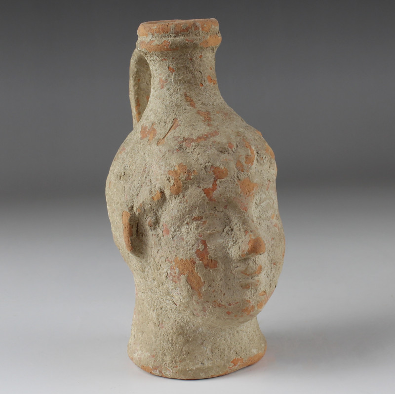 ITEM: Jug in the form of a head
 MATERIAL: Pottery
 CULTURE: Roman
 PERIOD: 2...