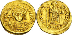 Mauricio Tiberio (582-602). Constantinopla. Sólido. (Ratto 996 var) (S. 476). Anv.: D. N. TIbR. AVRIC. PP. AV. Su busto coronado y acorazado de frente...