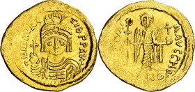 Mauricio Tiberio (582-602). Constantinopla. Sólido. (Ratto 1002) (S. 478). Anv.: O. N. AVRC. TIb. PP. AVG. Su busto galeado, drapeado y acorazado de f...