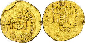 Mauricio Tiberio (582-602). Theopolis. Sólido. (Ratto 1018) (S. 524). Anv.: O. N. A(VRC). TIb. PP. AVI. Su busto galeado, drapeado y acorazado de fren...