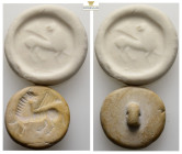 Near Eastern Stamp Seal
(31,6mm)
Obv: Winged mythological animal standing right, head left