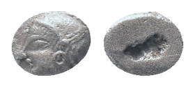 IONIA, Phokaia, Trihemiobol, 521-478 BC, AR Obv: Female head left, wearing helmet or close fitting cap Rev: Quadripartite incuse square Condition: Goo...