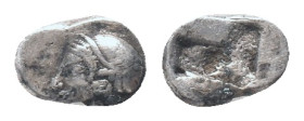IONIA, Phokaia, Trihemiobol, 521-478 BC, AR Obv: Female head left, wearing helmet or close fitting cap Rev: Quadripartite incuse square Condition: Goo...