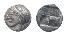 IONIA, Phokaia, Trihemiobol, 521-478 BC, AR Obv: Female head left, wearing helmet or close fitting cap Rev: Quadripartite incuse square Condition: Goo...