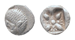 IONIA, Miletos, obol, late 6th century BC. AR Obv: Forepart of roaring lion right, head reverted. Rev: Star-shaped ornament in square incuse Condition...