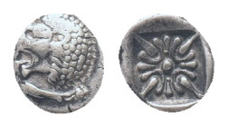 IONIA, Miletos, obol, late 6th century BC. AR Obv: Forepart of roaring lion right, head reverted. Rev: Star-shaped ornament in square incuse Condition...