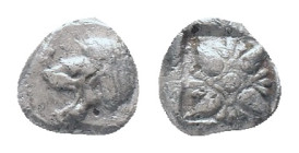 IONIA, Miletos, obol, late 6th century BC. AR Obv: Forepart of roaring lion right, head reverted. Rev: Star-shaped ornament in square incuse Condition...