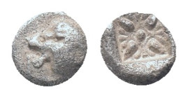 IONIA, Miletos, obol, late 6th century BC. AR Obv: Forepart of roaring lion right, head reverted. Rev: Star-shaped ornament in square incuse Condition...