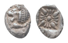 IONIA, Miletos, obol, late 6th century BC. AR Obv: Forepart of roaring lion right, head reverted. Rev: Star-shaped ornament in square incuse Condition...