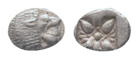 IONIA, Miletos, obol, late 6th century BC. AR Obv: Forepart of roaring lion left, head reverted. Rev: Star-shaped ornament in square incuse Condition:...
