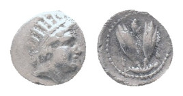 ISLANDS of CARIA. Rhodos. Rhodes. Circa 275-250 BC. Diobol, AR Obv: Radiate head of Helios to right. Rev. Two rose buds; above, helmet. Condition: Goo...